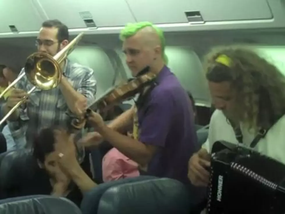 A Gypsy-Punk Band Performed on an Airplane During a Flight Delay
