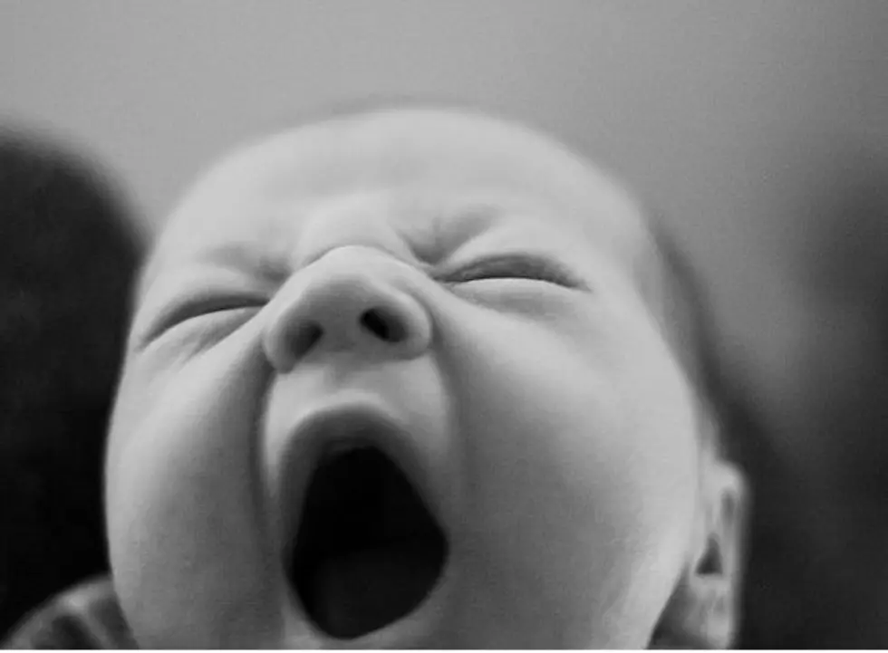 The Three Leading Theories for Why We Yawn