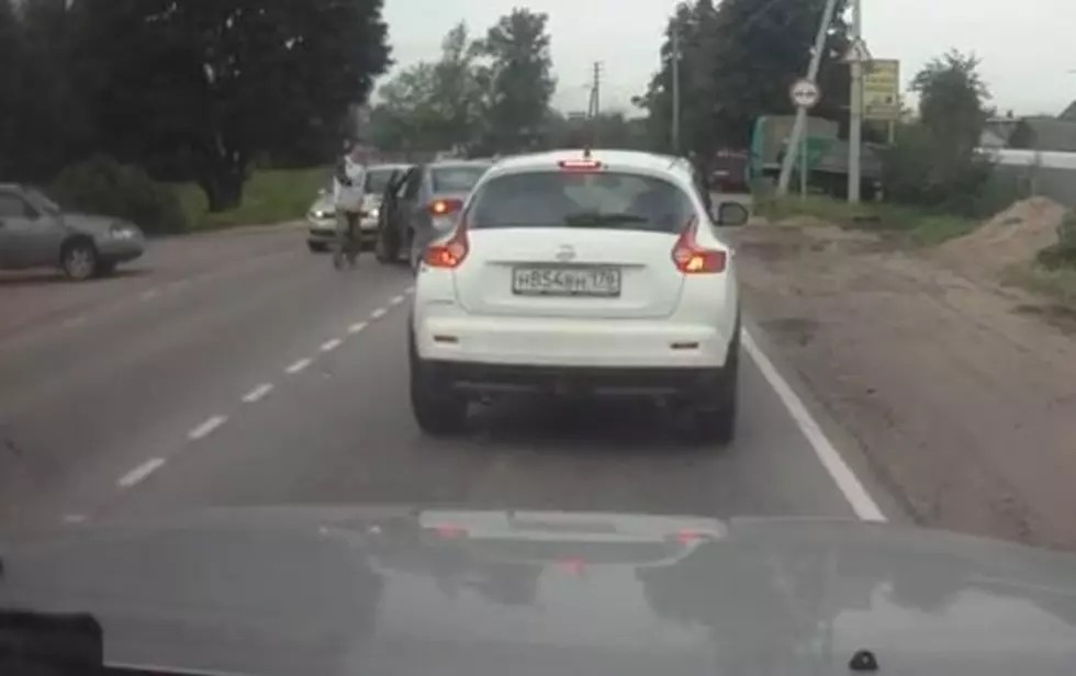 Guy Gets Cut Off By a Driver On Their Cell Phone – So He Takes the Phone And Smashes It
