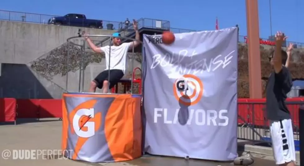 Dude Perfect Fills Dunking Booth With Gatorade for the World’s Longest Dunk Tank Throw