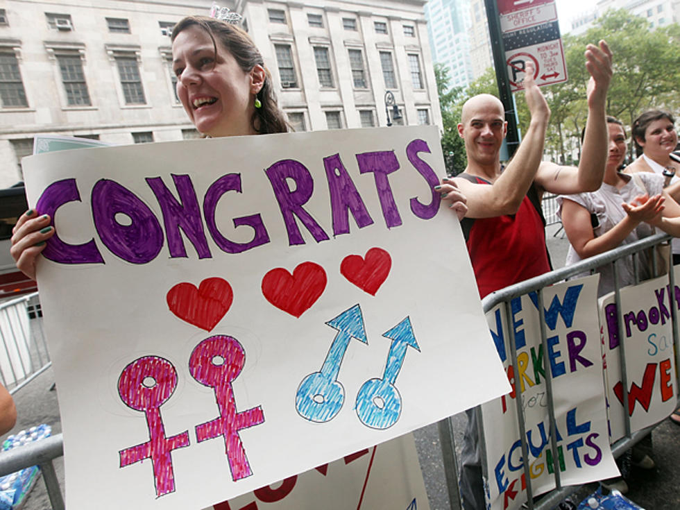 Gay Couples Begin Marrying in New York
