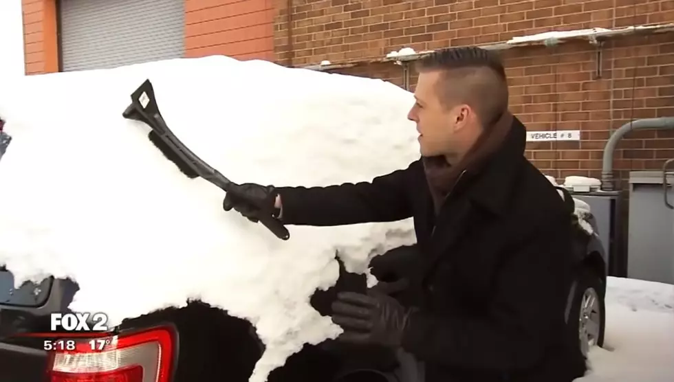 Sarcastic Weatherman Demonstrates How To Clean Snow Off A Car
