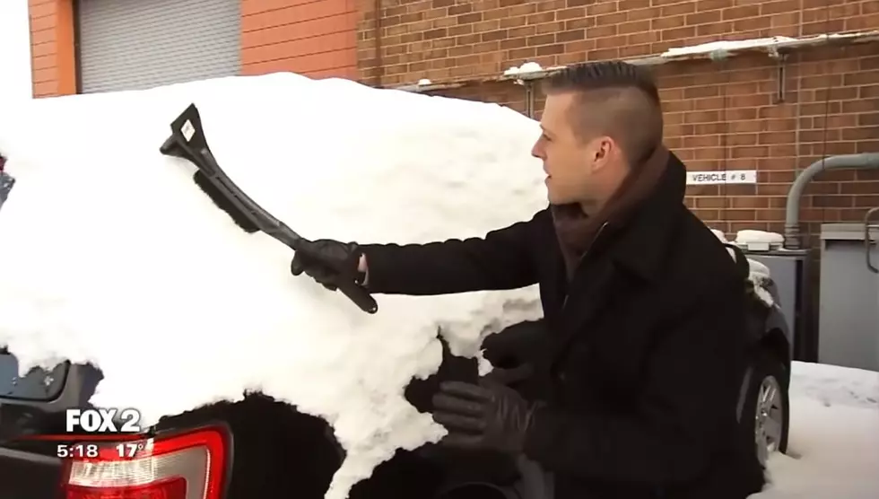 WATCH: Sarcastic Weatherman Demonstrates How To Clean Snow Off A Vehicle