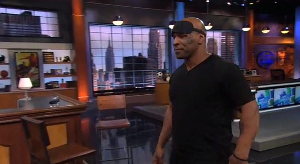 Watch Mike Tyson Throwing Darts Blindfolded