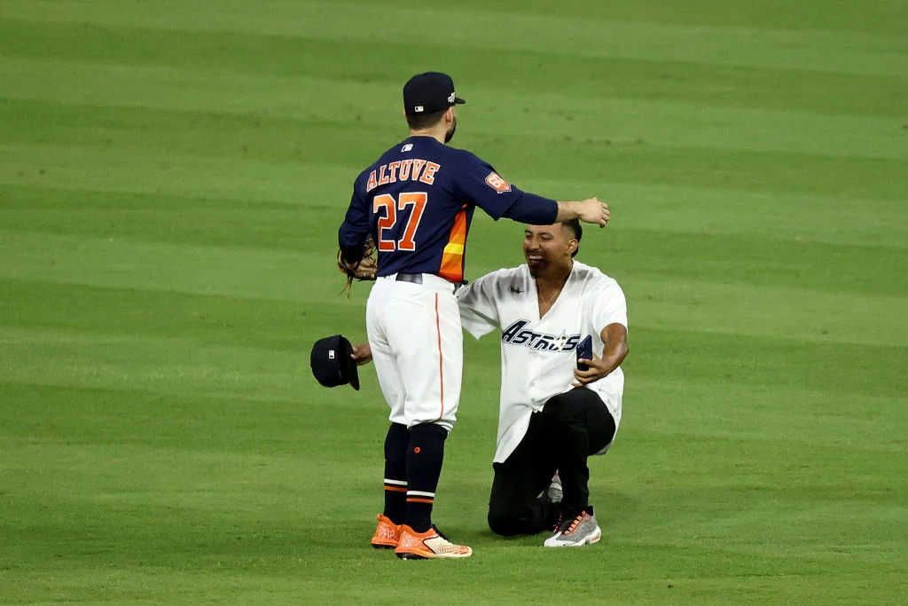 WATCH: Crazed Fan Runs Onto Field, Hugs Houston Astros' Jose Altuve -  Fastball