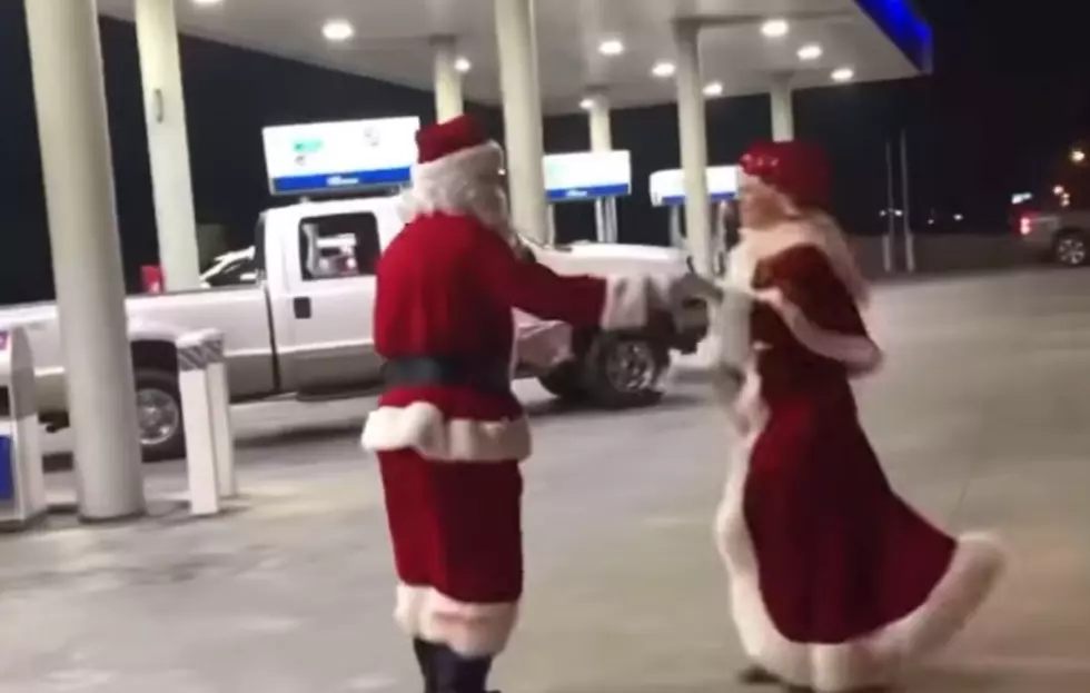 Watch Santa And Mrs. Claus Two-Stepping At Gas Station In La