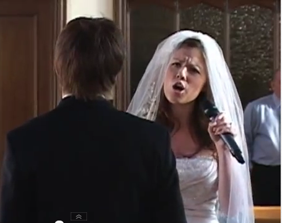 AWKWARD!  Bride Sings Her Way Down The Aisle To Her Groom