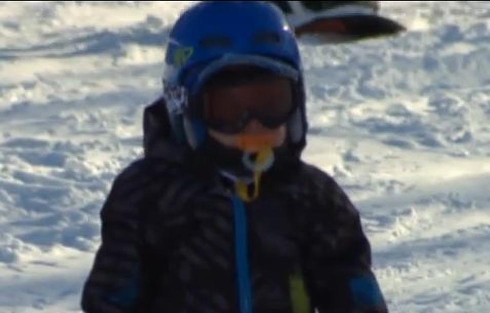 Watch Toddler with Pacifier Snowboard [VIDEO]