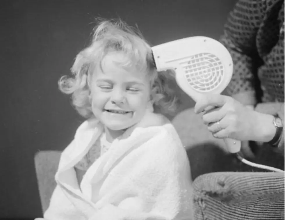 Father Uses A Vacuum Cleaner In Unconventional Hair Styling Technique