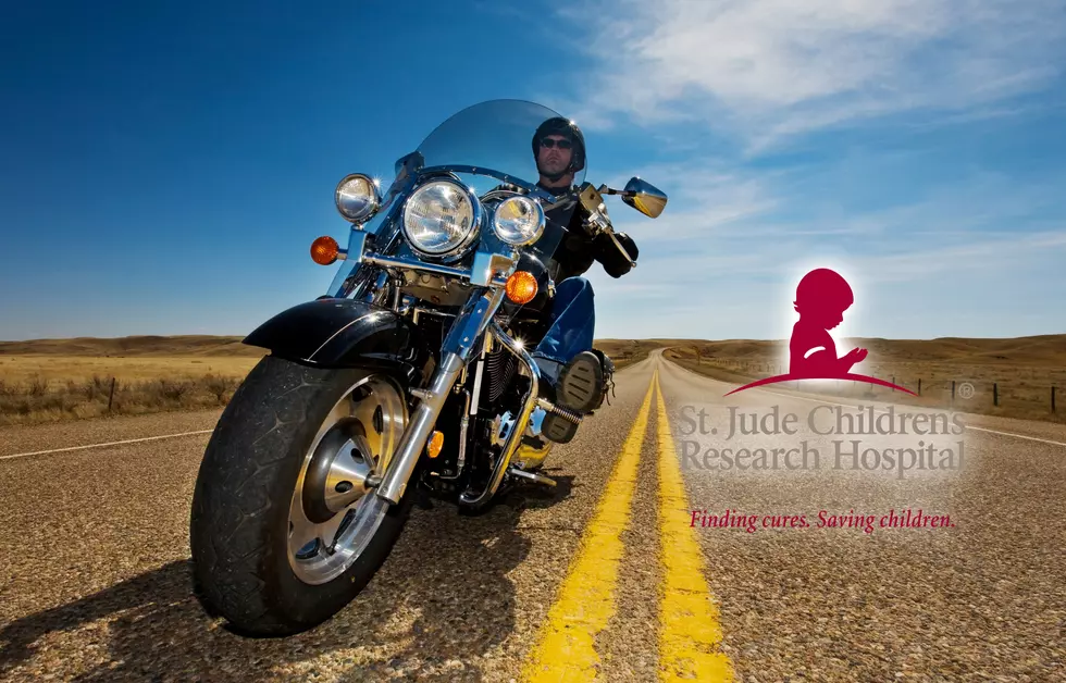 PIGS Motorcycle Group Presents Check on St. Jude Radiothon