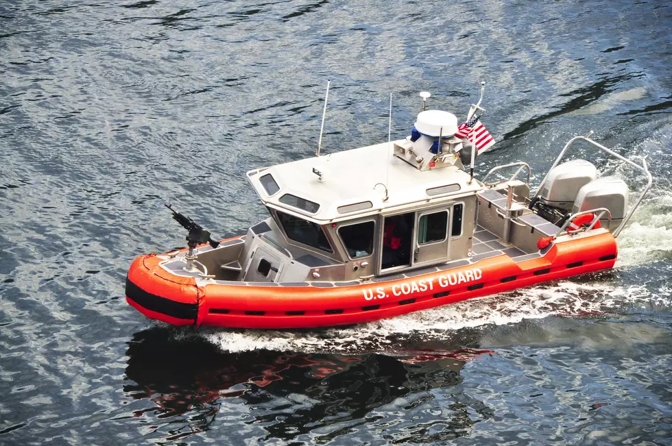 A US Coast Guard boat patrols the ocean.