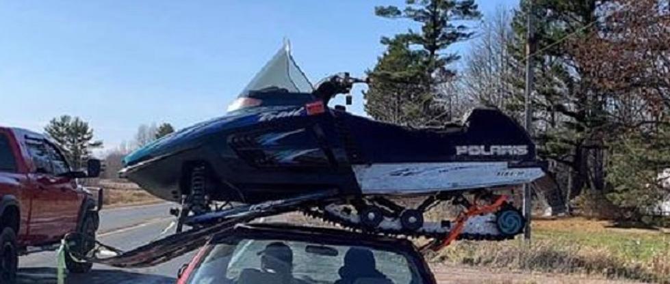 OMG! Minnesota State Patrol Shares Picture Of Car Carrying Snowmobile