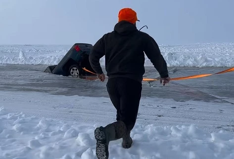 Minnesota Man Shares Dramatic Video Of Truck Falling Through Ice