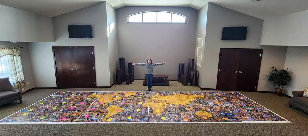 Wisconsin Community Tackles 60,000-Piece Puzzle + Finish With One Piece Missing