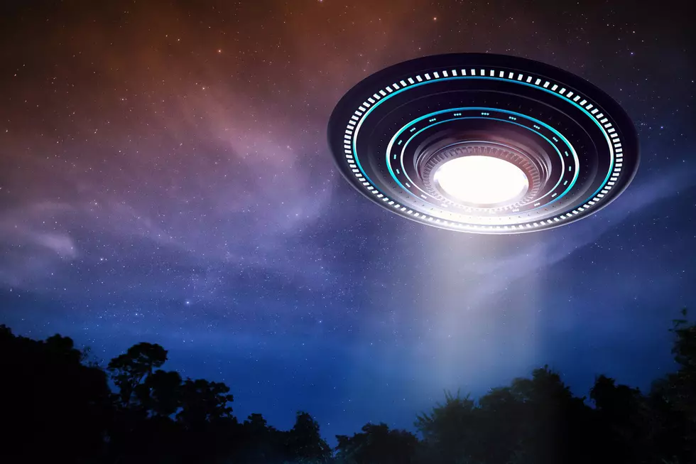 3d rendering metal ufo or alien spaceship in the sky