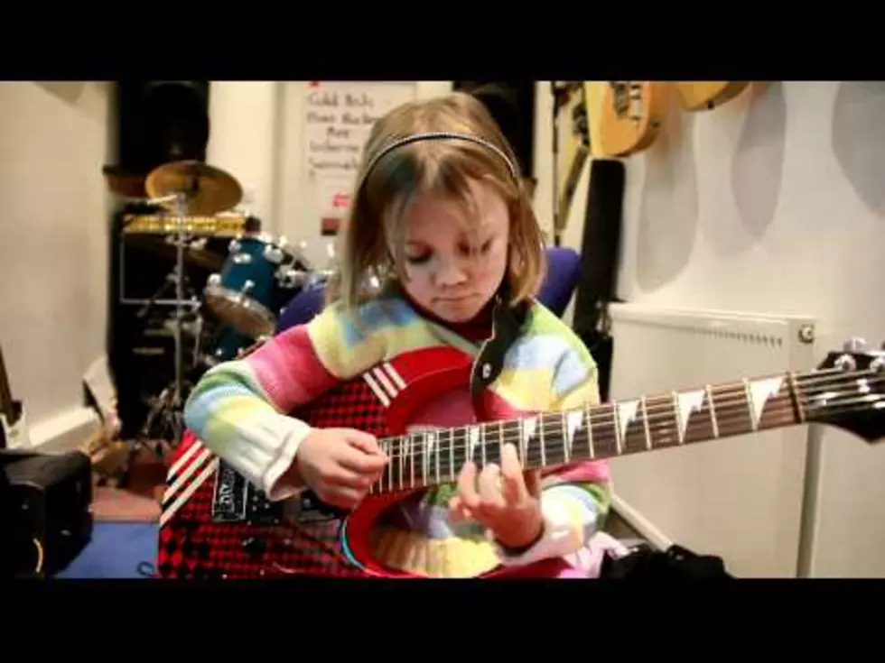 First Grader Rocks ‘Sweet Child O Mine’ On The Guitar [VIDEO]