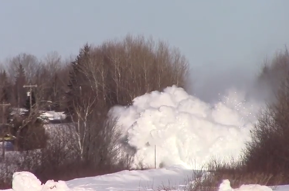 See the Awesomeness of a Locomotive Plowing Through Several Feet of Snow