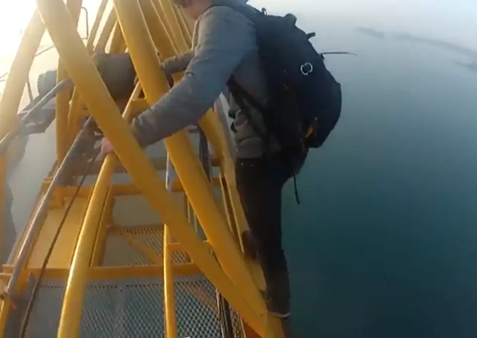 Climbing an 800 Foot Suspension Bridge Without Safety Equipment [VIDEO]