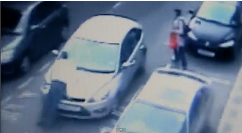Woman Takes Man For a Scary Ride on The Hood of Her Car [VIDEO] [POLL]