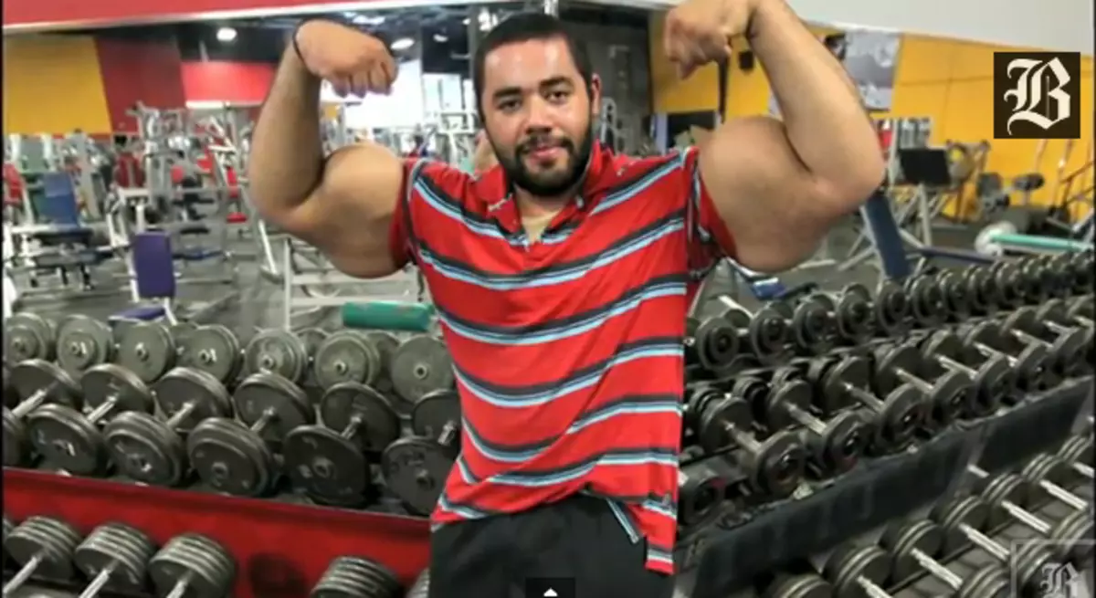 Man Holds Guinness World Record for 'Biggest Biceps'