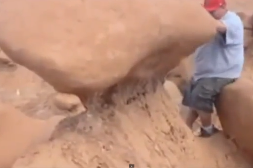Boy Scout Leader Attempts To Make Rock Formation Safer For Public [VIDEO]