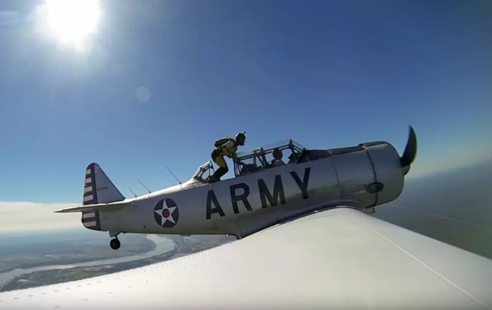 Amazing Jump – Skydiver Does A Zero-G Leap From A T-6 Texan Warbird