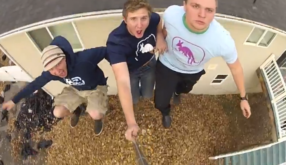 Watch These Guys Jump Off Their Roof into a 17-Foot High Pile of Leaves [VIDEO]