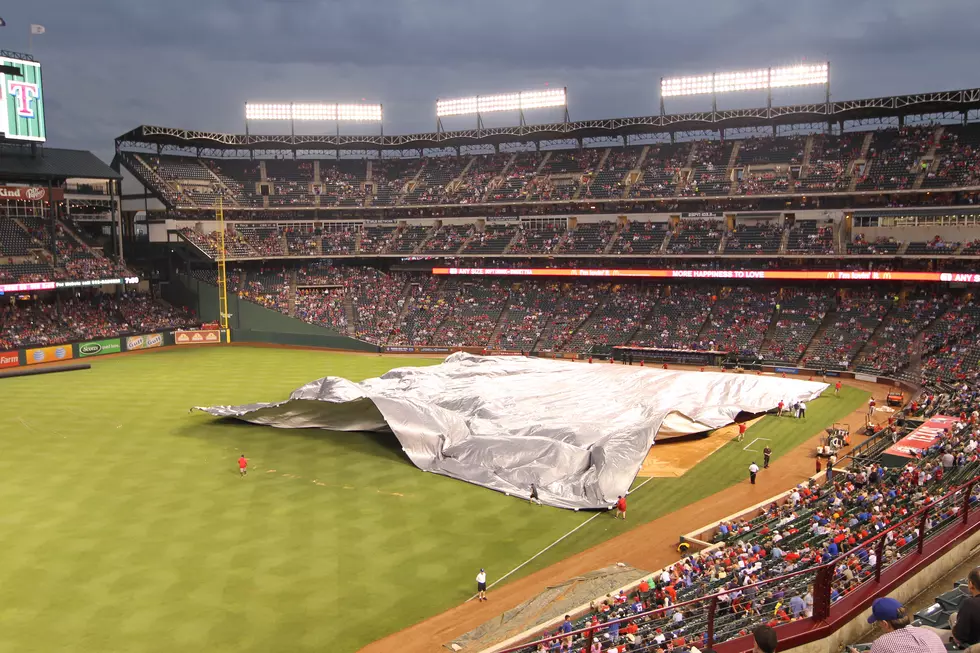 Texas Rangers Grounds Crew Gets Tossed Around by the Weather [VIDEO]