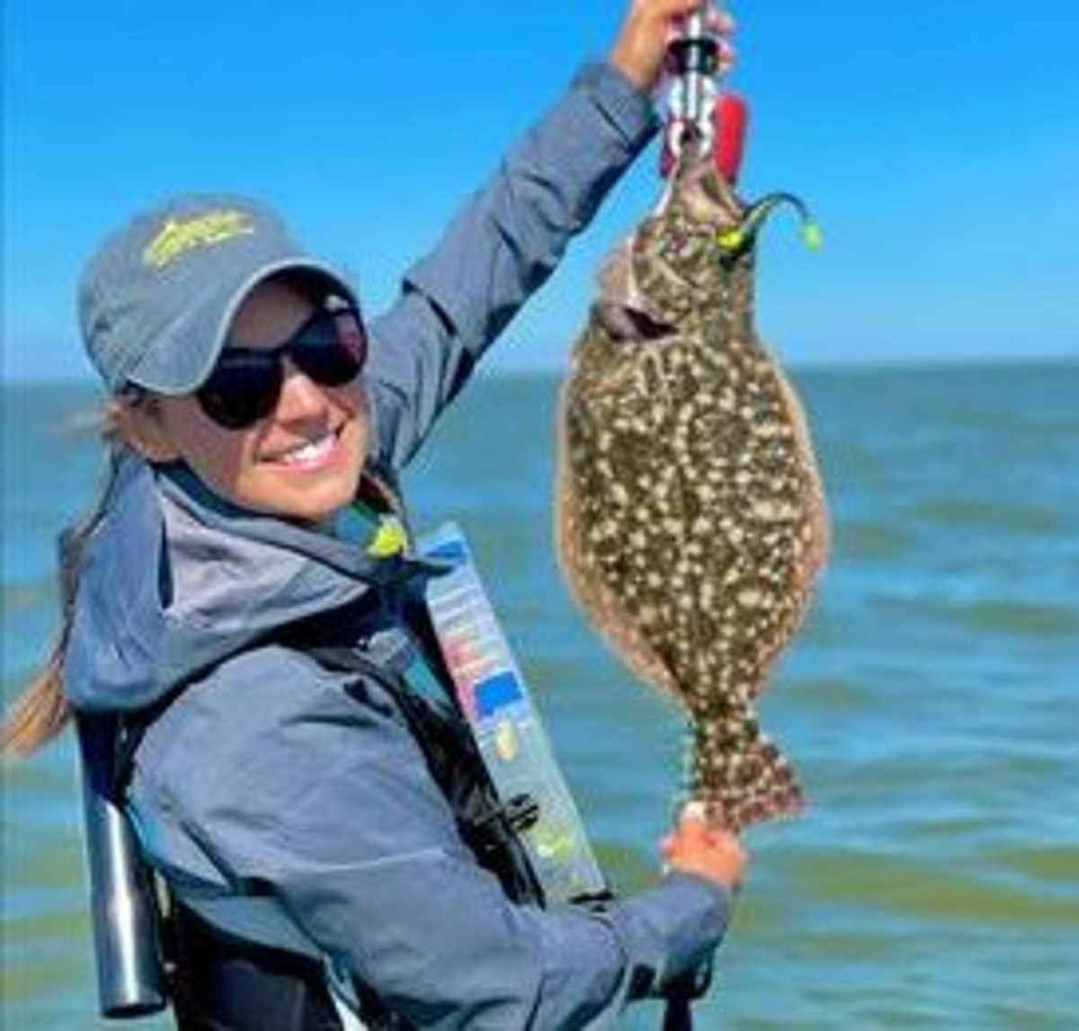 Texas Angler Hooks 23-Inch Flounder in Galveston