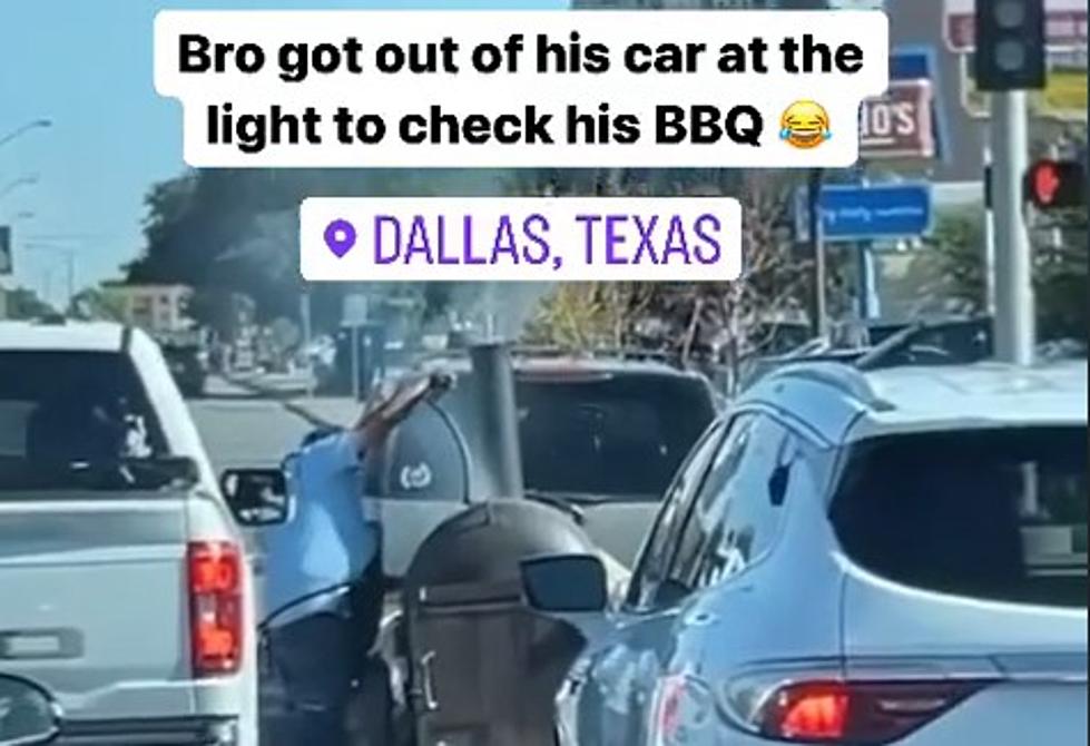 Welcome to Texas: Guy Checks on BBQ at Light [VIDEO]