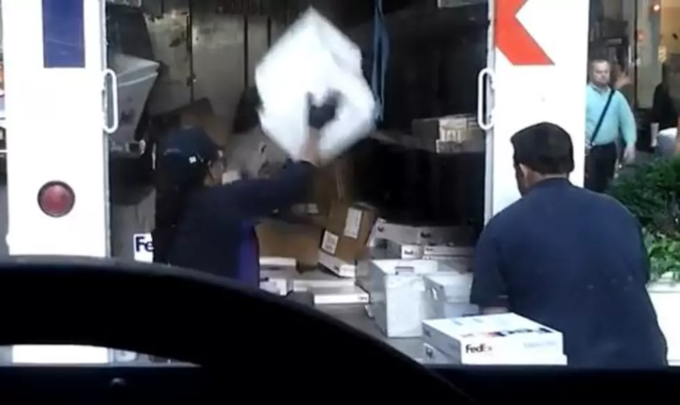 Fed Ex Employees Throwing Packages Into Truck [VIDEO]