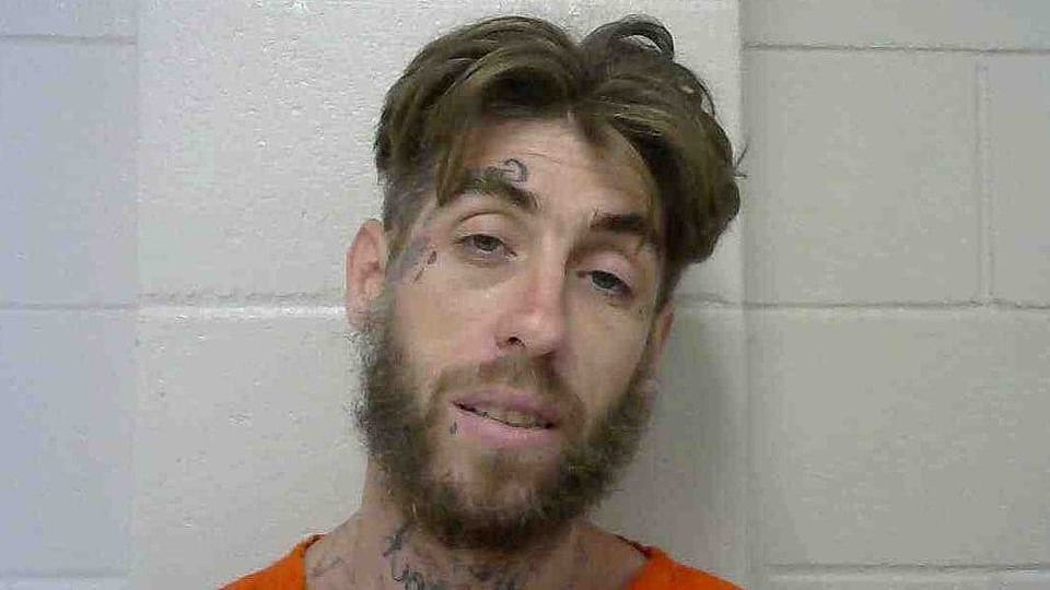 Louisiana Woman Finds Man With 20 Arrests Living in Her Attic photo pic