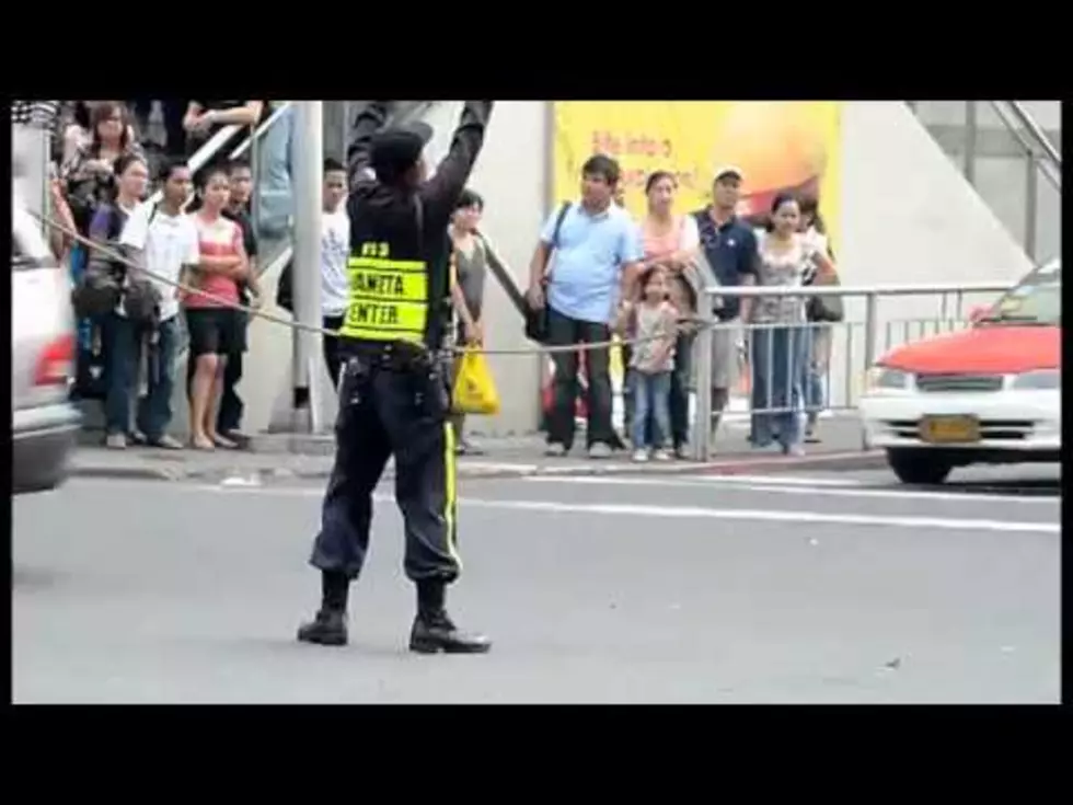 Cop Gets Funky Directing Traffic [VIDEO]