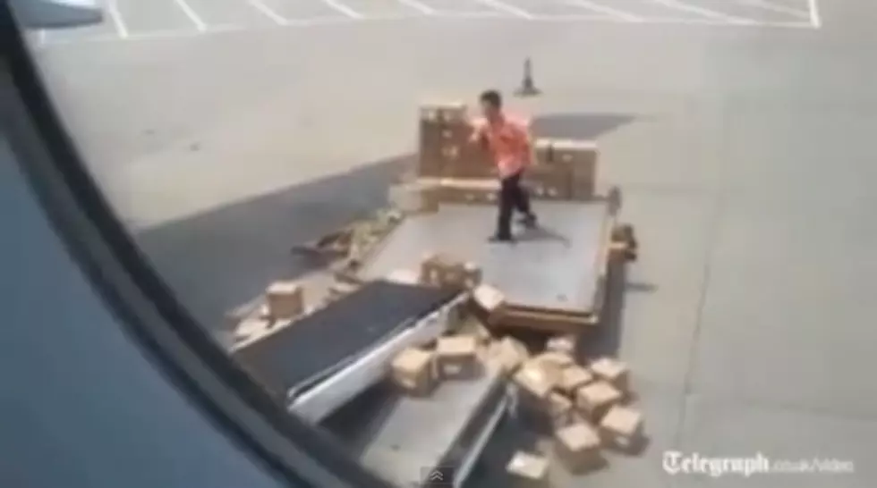 Terrible Baggage Handler Caught in the Act [VIDEO]