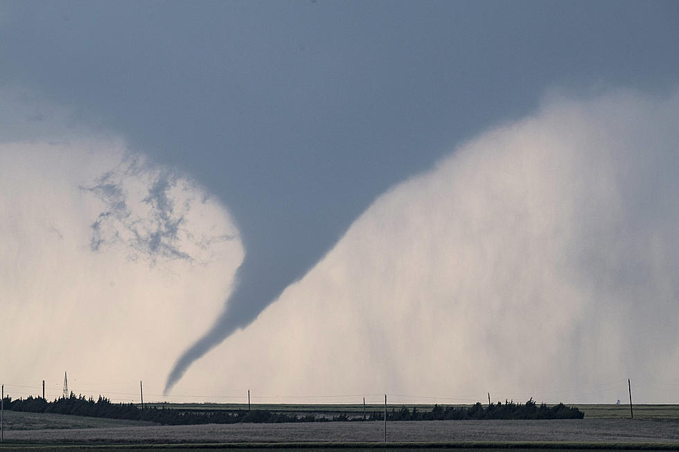 Watch Incredible Video of a Guy Pulling Out of His Garage Into a Tornado