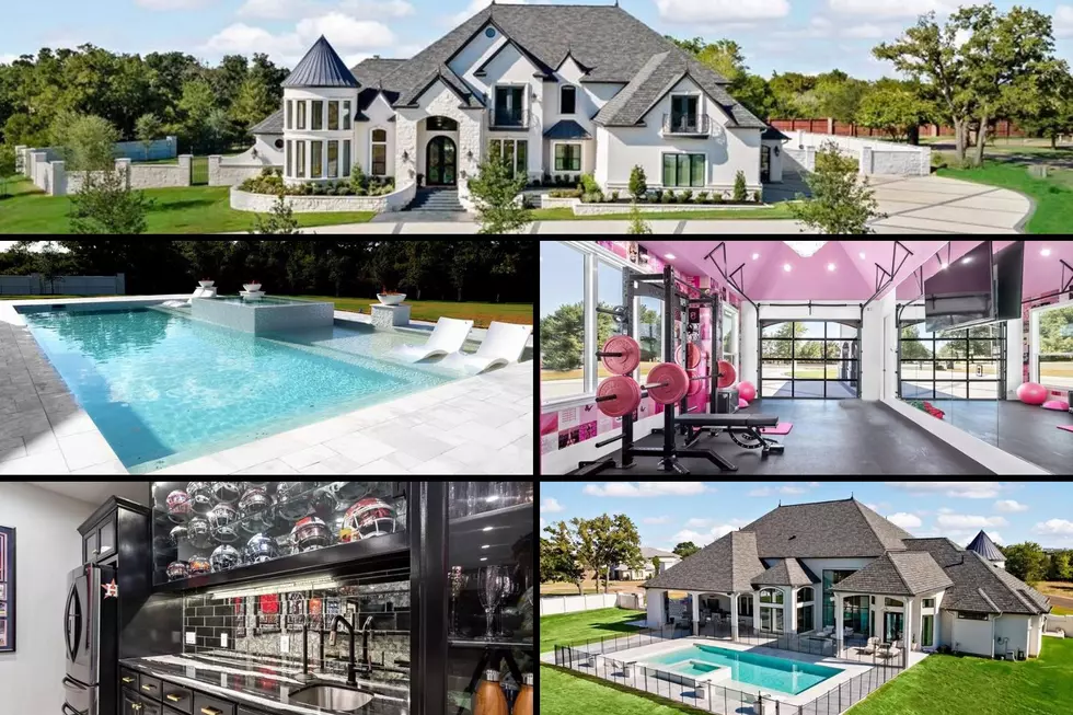 Bright Pink Gym and Chandelier in This Bryan, Texas Mansion 