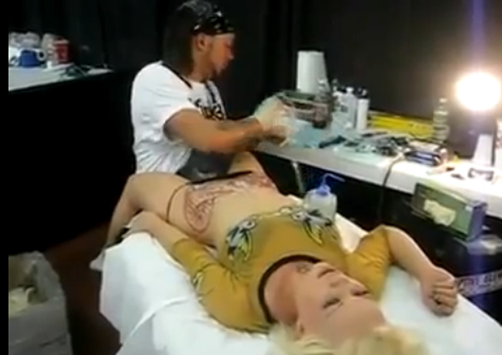 Woman REALLY Enjoys New Tattoo