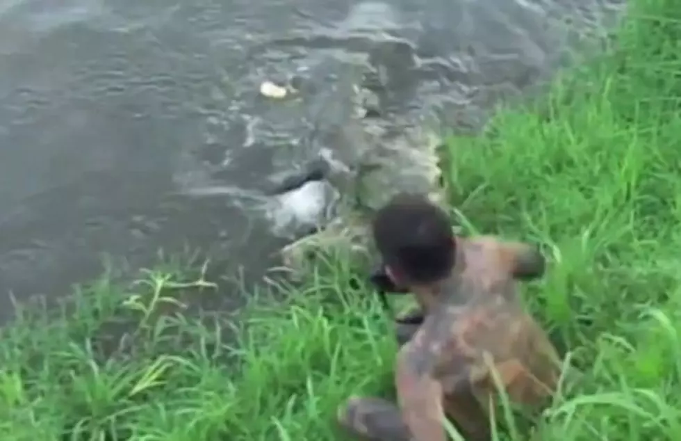 Wildlife Photographer Narrowly Misses Becoming A Crocodile’s Lunch [VIDEO]