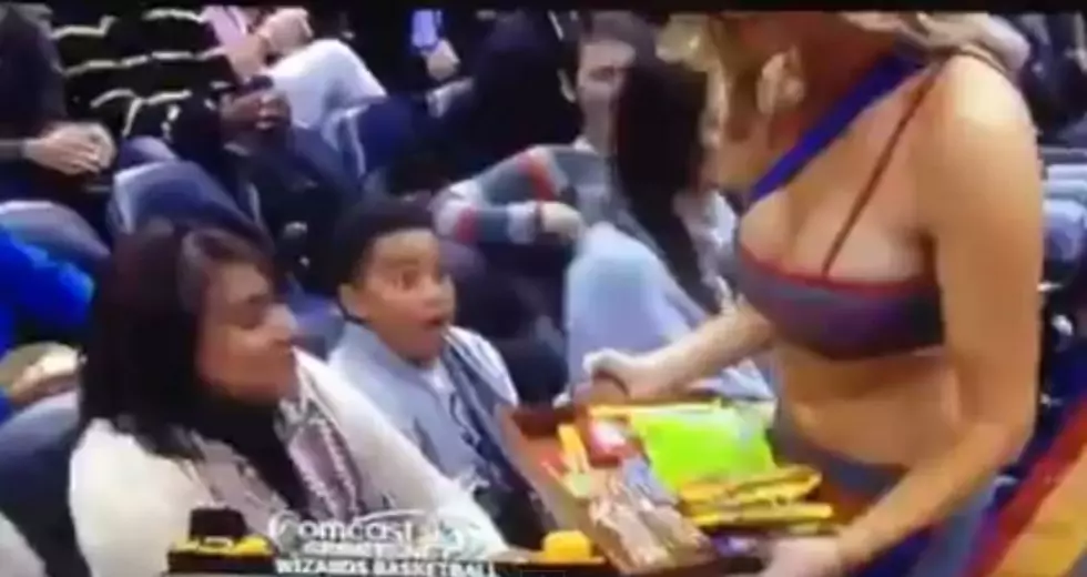 Kid at Basketball Game Can&#8217;t Believe Woman&#8217;s Awesome Breasts