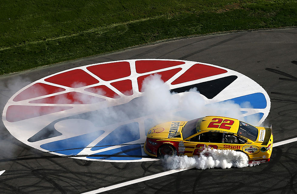 Joey Logano Holds Off Harvick For Charlotte Win