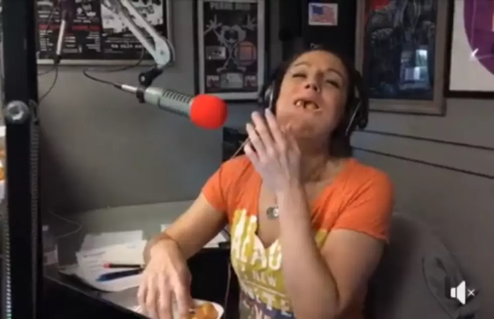 Watch The RockShow Co-Host Kelly Plasker Stuff Donut Holes in Her Mouth