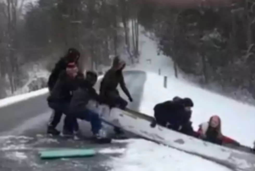 Kids Use Snow for Boat Launch &#8212; Looks Like Fun