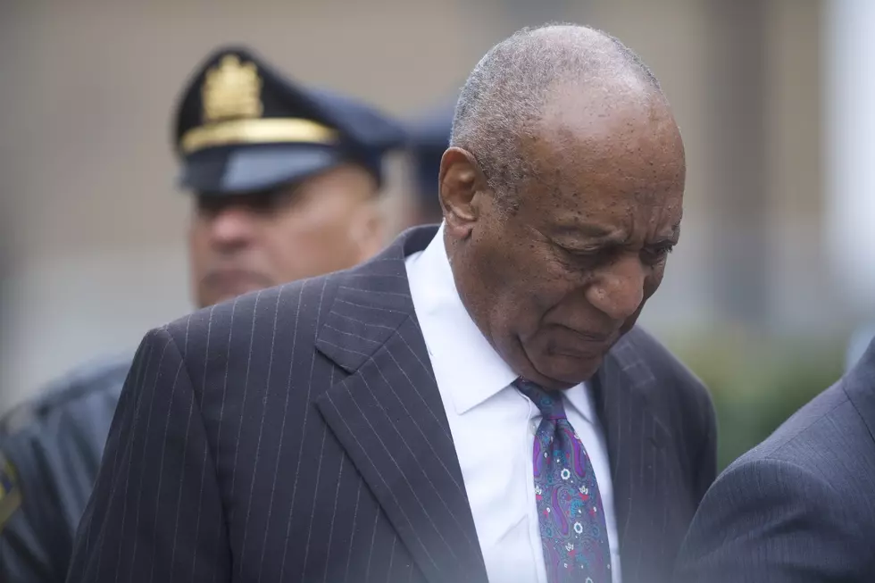 A Topless Woman Ambushed Bill Cosby Outside The Courthouse 