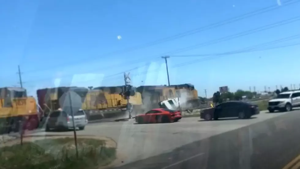 Police Car Clobbered By Passing Train