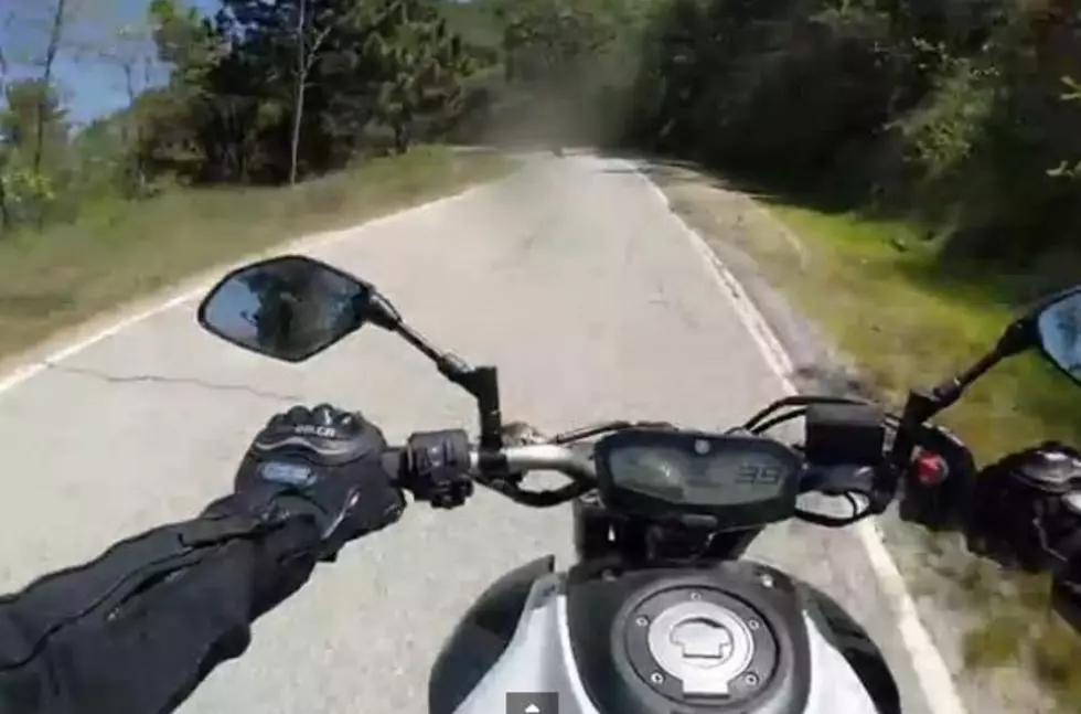 Watch This Motorcyclist Crash Head-On Into an Oncoming Firetruck [VIDEO]