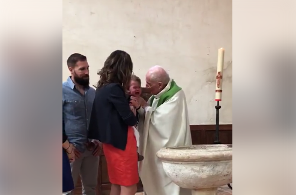 So Uncomfortable–This Priest Slaps A Baby on Facebook During Baptism [VIDEO]