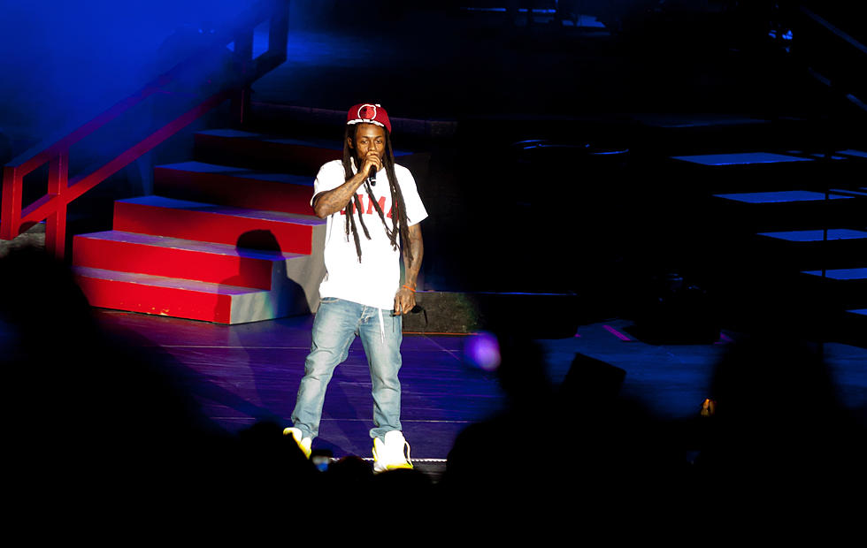 Lil Wayne Quickly Escort’s Underage Fan Off Stage At a Recent Concert [VIDEO]