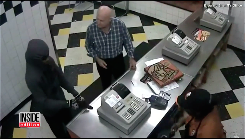Armed Robber Apologizes While Stealing Money from Pizza Joint [VIDEO]
