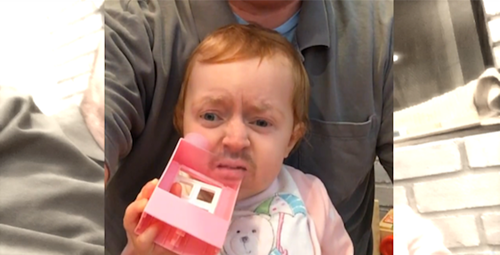 Watch a Dad Hilariously Face Swap with His Baby on Snapchat [VIDEO]