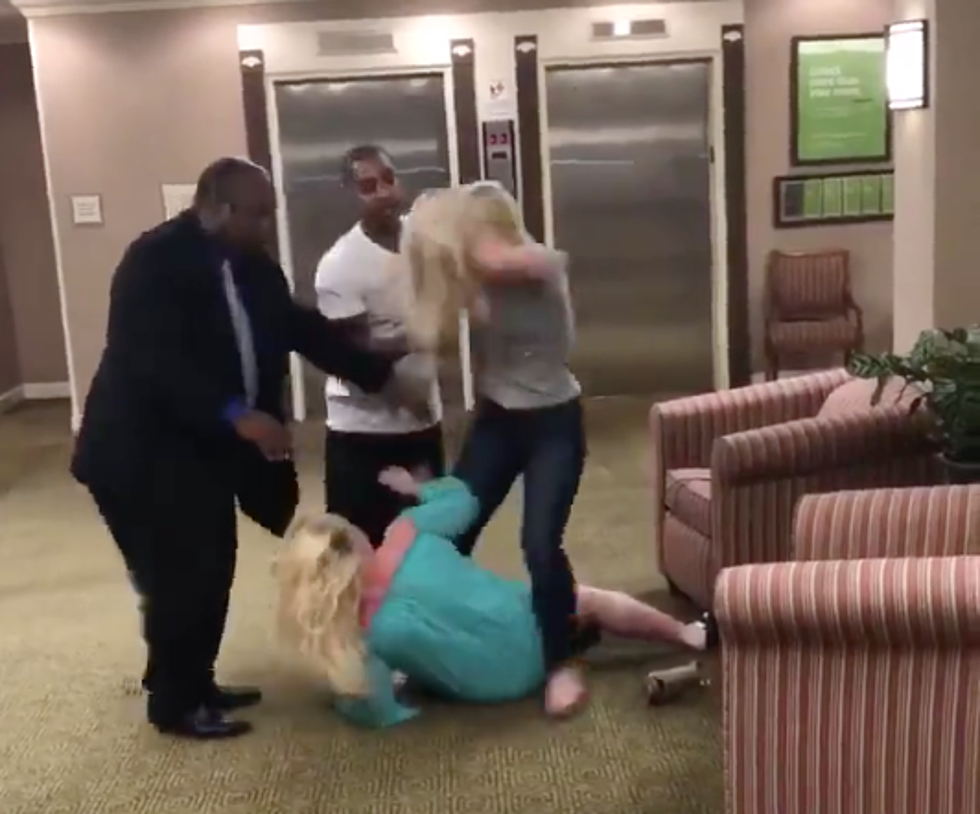 Woman Gets Handled After Making Racist Remarks and Putting Her Hands on Another Woman [NSFW]